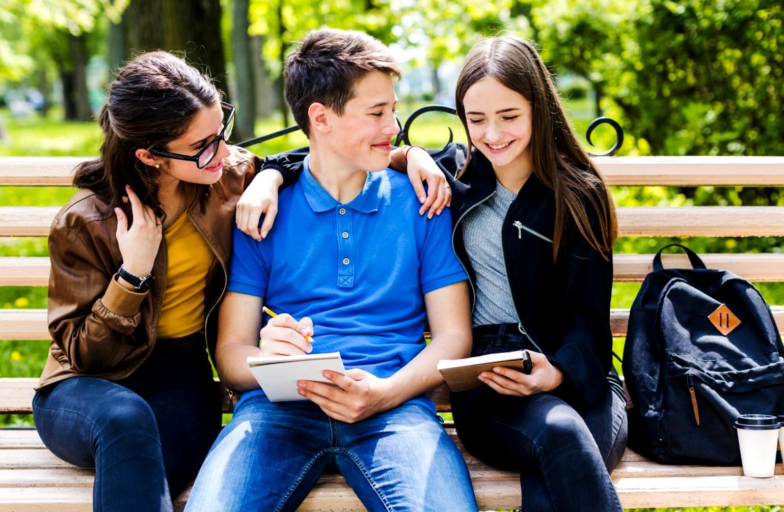 Modern workspace showing laptop and mobile devices running budget tracking interface